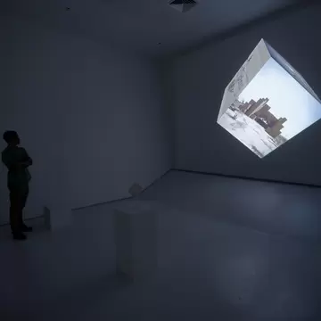 NEW YORK, NY - APRIL 14:  A preview attendee explores an interactive film exhibit entitled "Google Cube-Untitled" during the Sensory Stories Press Preview held at the Museum of the Moving Image on April 14, 2015 in New York City.  (Photo by Brent ...