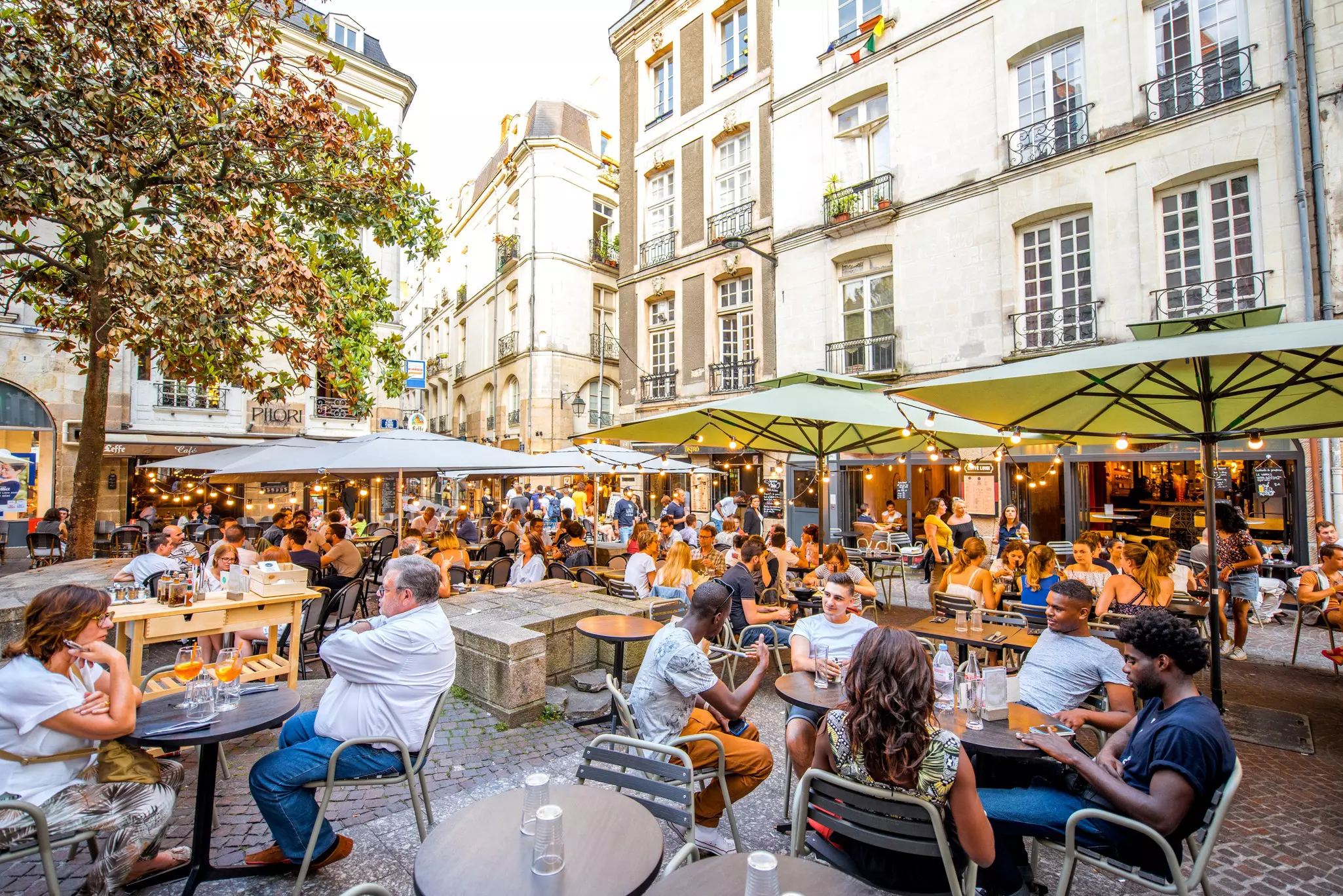 Experience the ambience of a town square filled with restaurants in Nantes © RossHelen / Shutterstock
