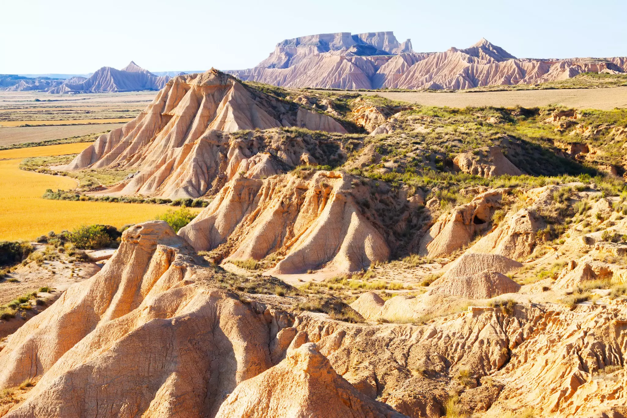 cliffs at landscape of bardenas reales natural park in  Navarra, Spain  License Type: media  Download Time: 2021-04-15T11:09:18.000Z  User: gwencotter  Is Editorial: No  purchase_order:   