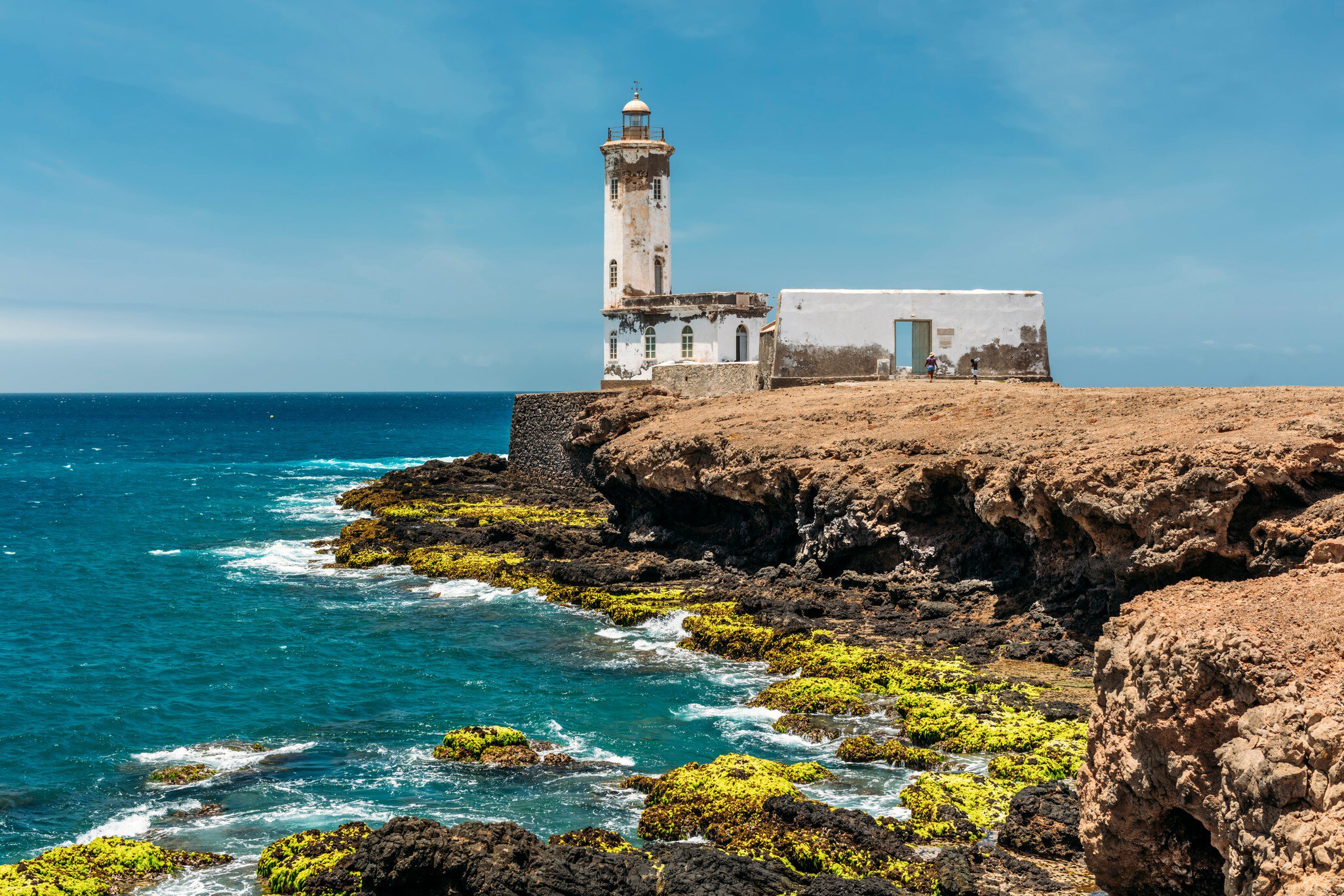 Lighthouse (Farol de D. Maria Pia) during the low tide in Praia, Cabo Verde., License Type: media, Download Time: 2024-08-12T11:30:32.000Z, User: fabricencoredesign31, Editorial: false, purchase_order: PO 56530, job: Global Publishing-WIP, client: Africa 15, other: Fabrice Robin