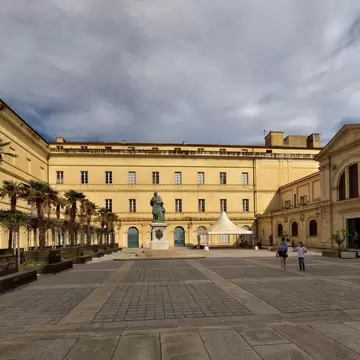 The main gate into Palais Fesch with the central museum of fine arts in Ajaccio in Corsica, France.