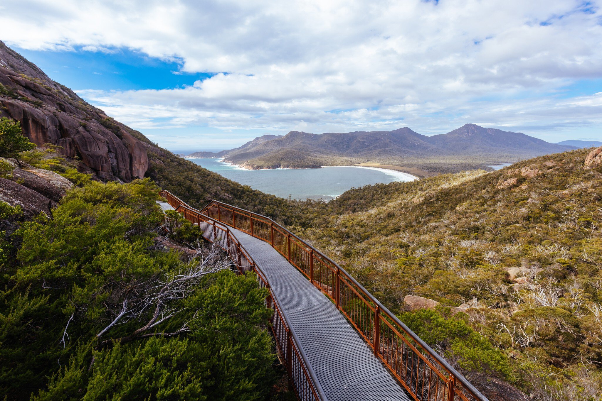 View over Wineglass Bay from the lookout and walkway on the Freycinet Peninsula Circuit in Tasmania, Australia.