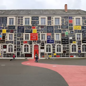 Facade of The Foundation of Doubt, Ben and Fluxus art exhibition gallery, exterior view, Loir et Cher department, France.