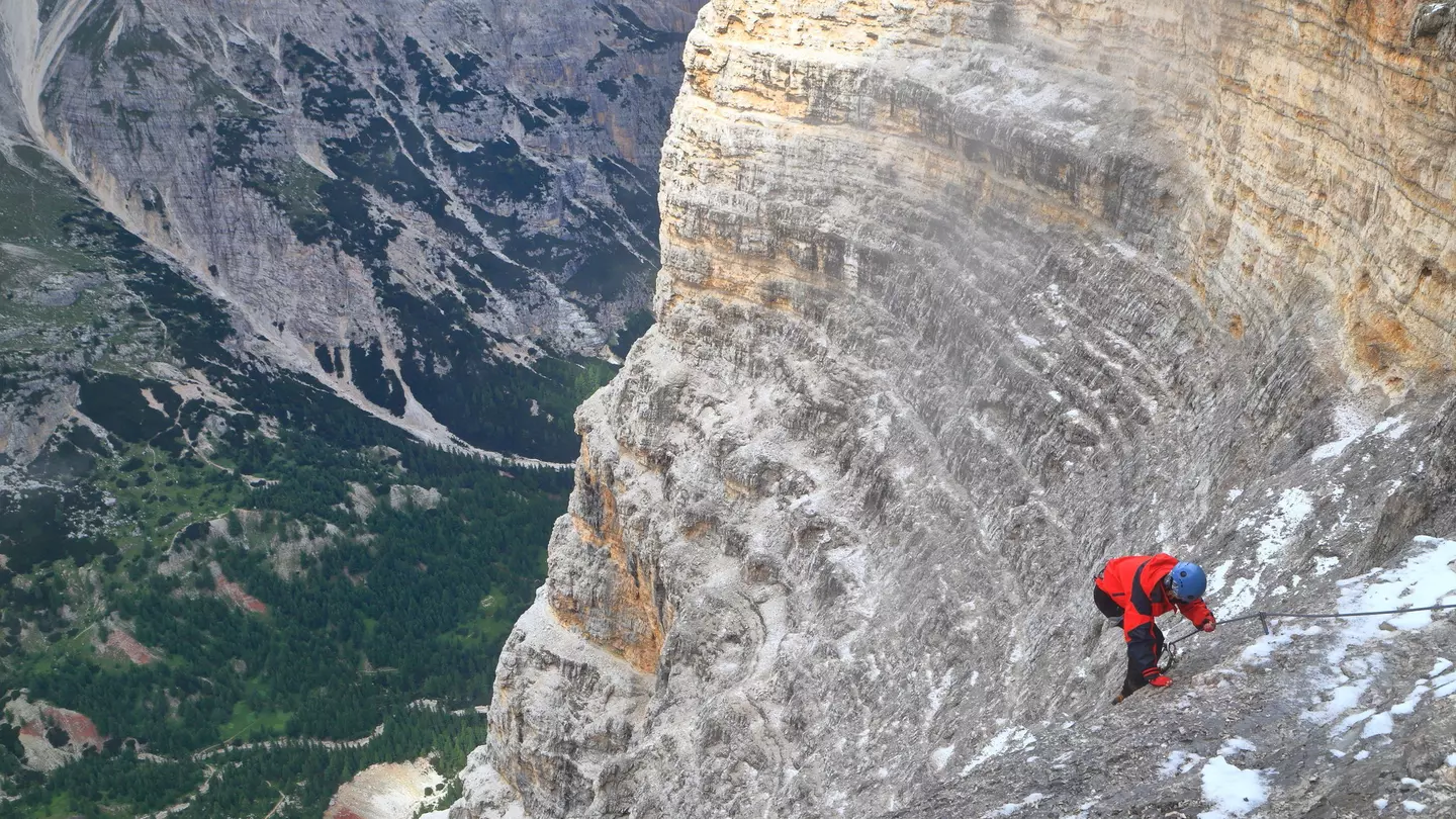 Climbers ascend the via ferrata