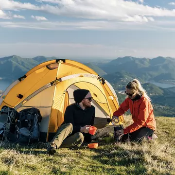 Camping in the mountains is a cost-effective way to experience Switzerland at its finest © Milo Zanecchia/ Ascent Xmedia / Getty Images