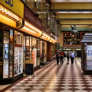 People visit Lucerna Palace entertainment complex, national cultural monument in New Town (Nove Mesto) district of Prague, Czech Republic.