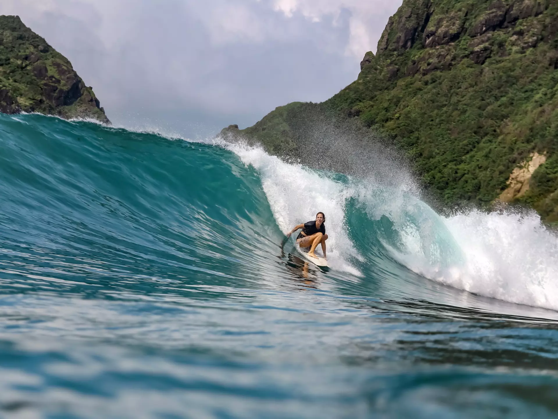 Surfing in Sumbawa, Indonesia. Konstantin Trubavin/Getty Images