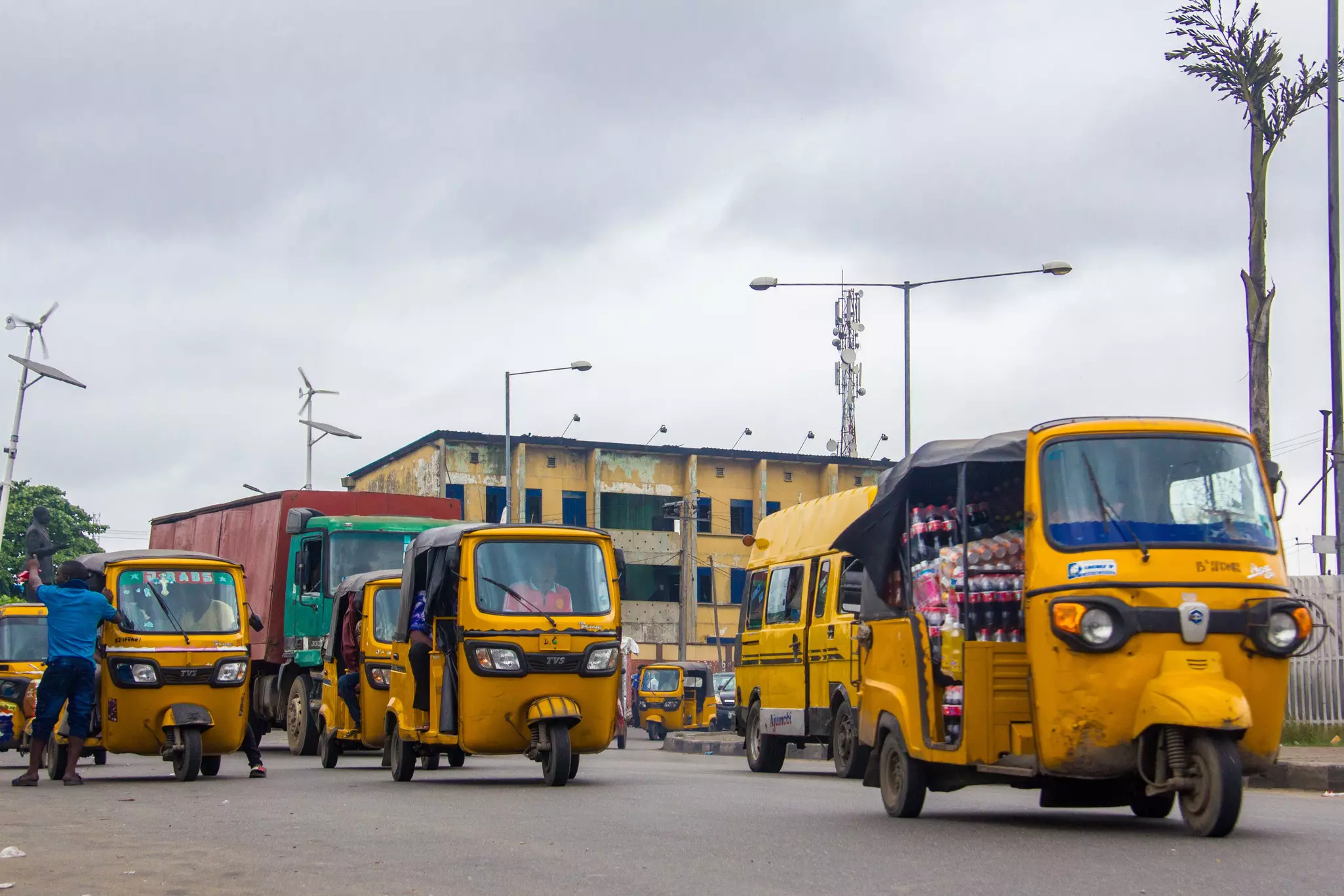 Tricycles are useful for getting to smaller neighborhoods in Nigeria © Shutterstock / shynebellz