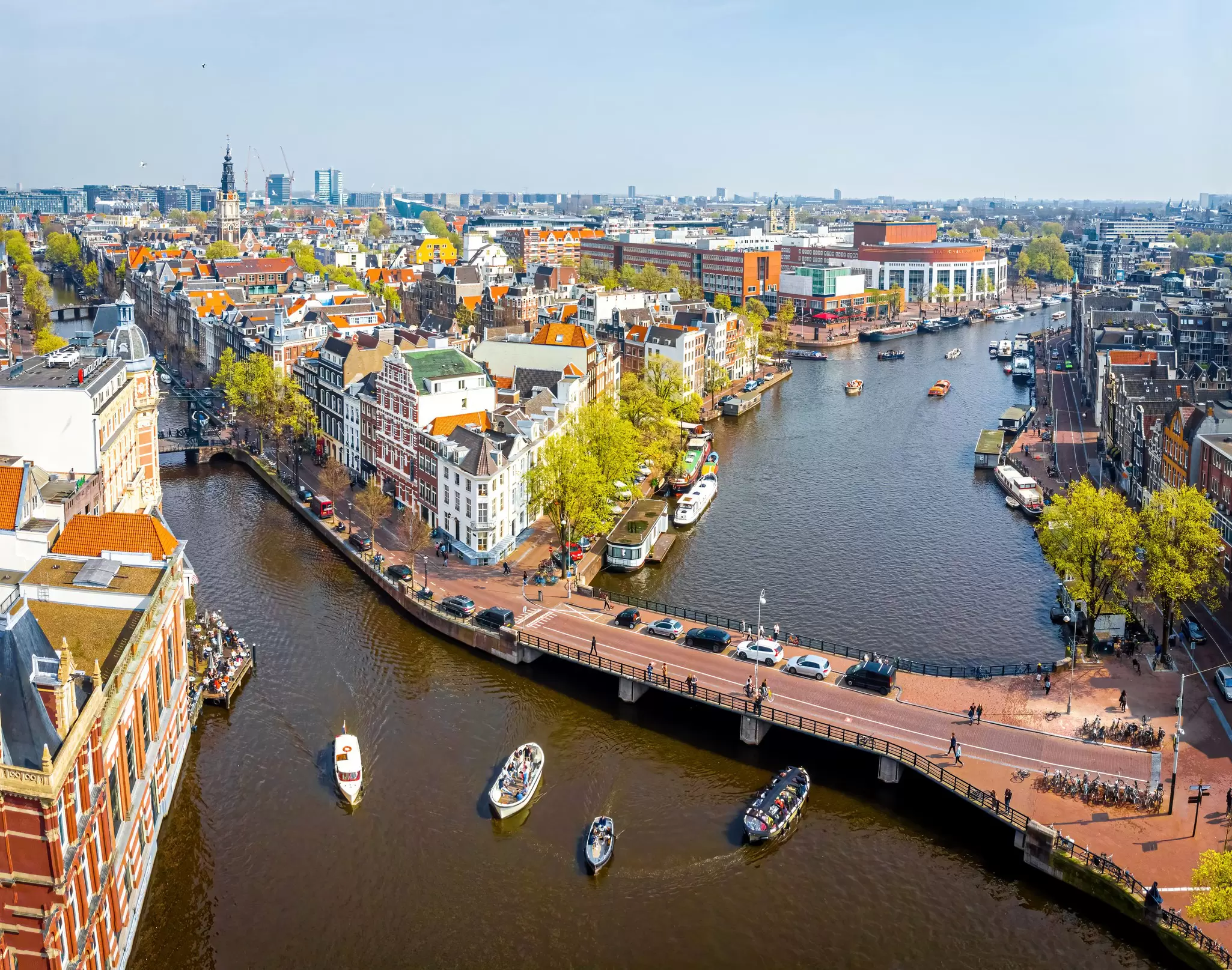A river and a canal branching off around a built-up city