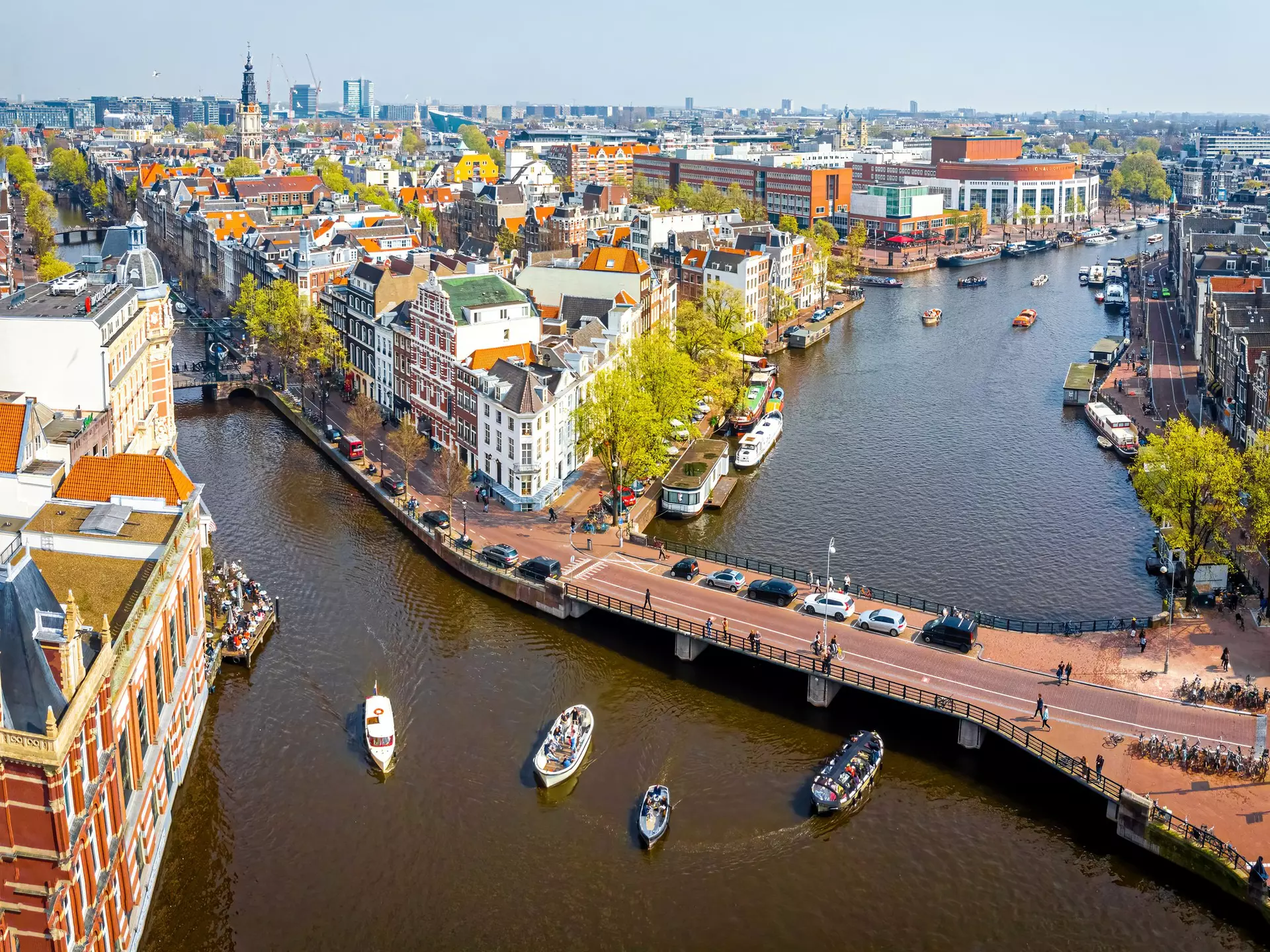 A river and a canal branching off around a built-up city