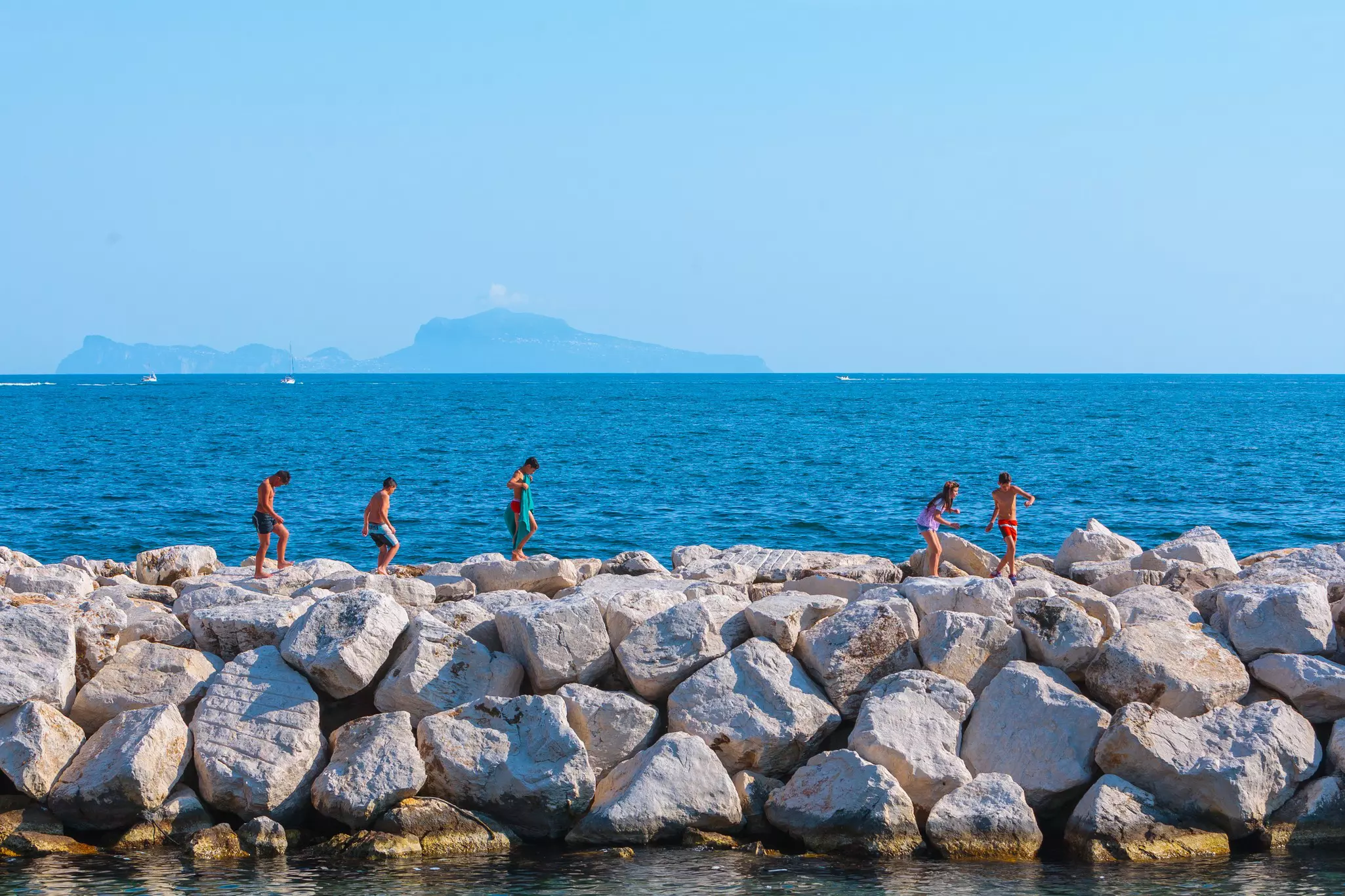 Naples, Italy - may 27: Summer day on the Mediterranean coast. People relax, sunbathe and swim on Mappatella Beach on Quay of Via Francesco Caracciolo. May 27, 2012. Naples, Campania, Italy., License Type: media, Download Time: 2025-07-02T01:21:58.000Z, User: rhylton_redventures, Editorial: true, purchase_order: 65050 - Digital Destinations and Articles, job: Lonely Planet, client: wip , other: Rhianydd Hylton