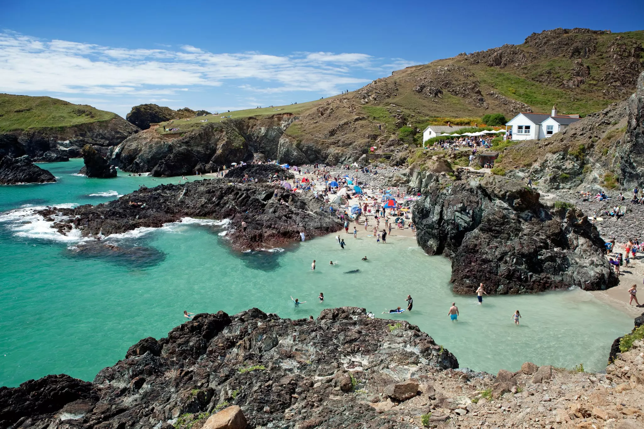 Kynance Cove, Cornwall, United Kingdom - July 30, 2016 - Picture taken in Kynance Cove in Cornwall showing beach full of turists