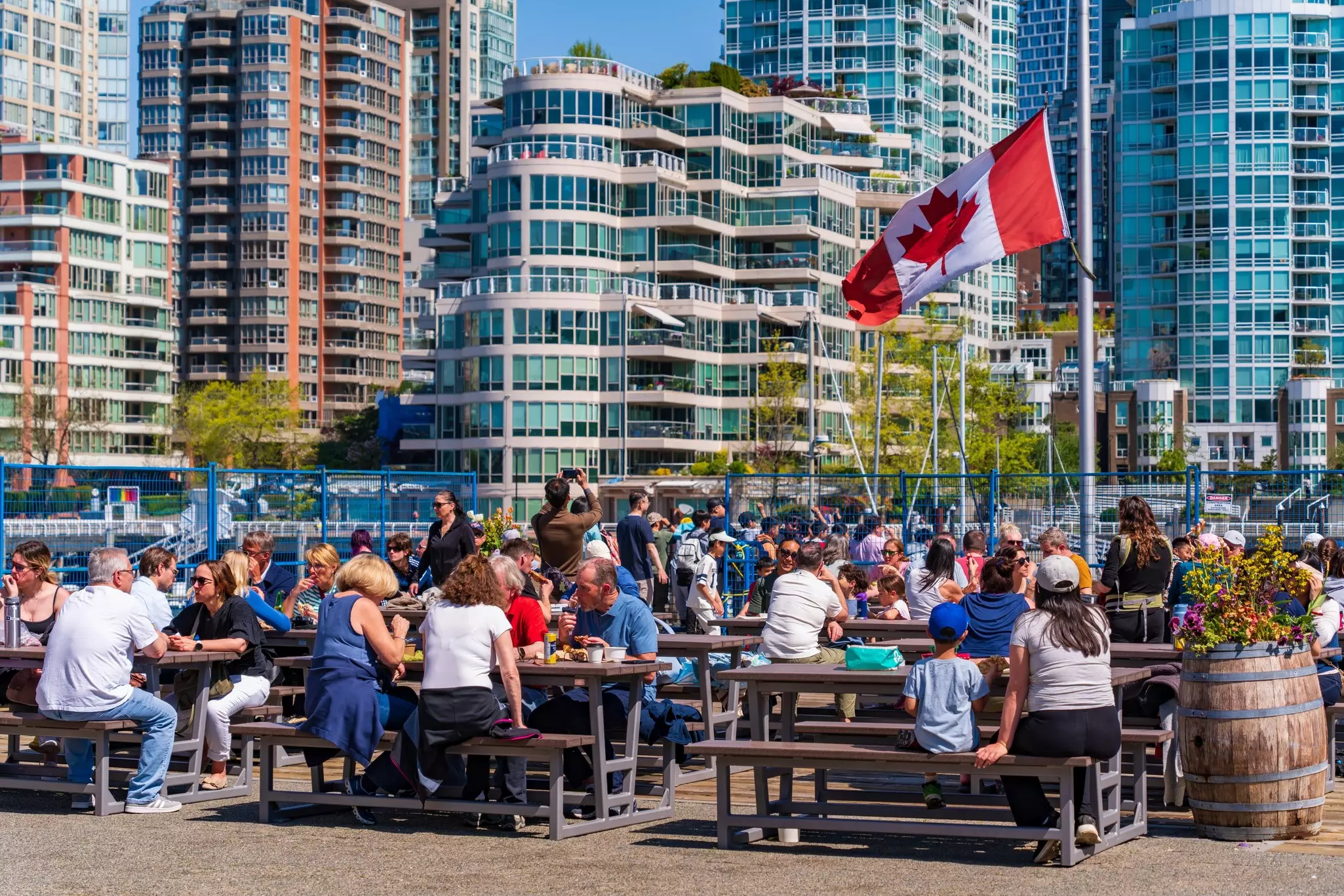 Vancouver, Canada - May 01 2025: People eating food at outdoor dining area at Granville Island Public Market in Vancouver, Canada, License Type: media, Download Time: 2025-08-14T05:06:29.000Z, User: claramonitto, Editorial: true, purchase_order: 56530 - Guidebooks, job: Global Publishing-WIP, client: Washington, Oregon & Pacific Northwest 10, other: Clara Monitto