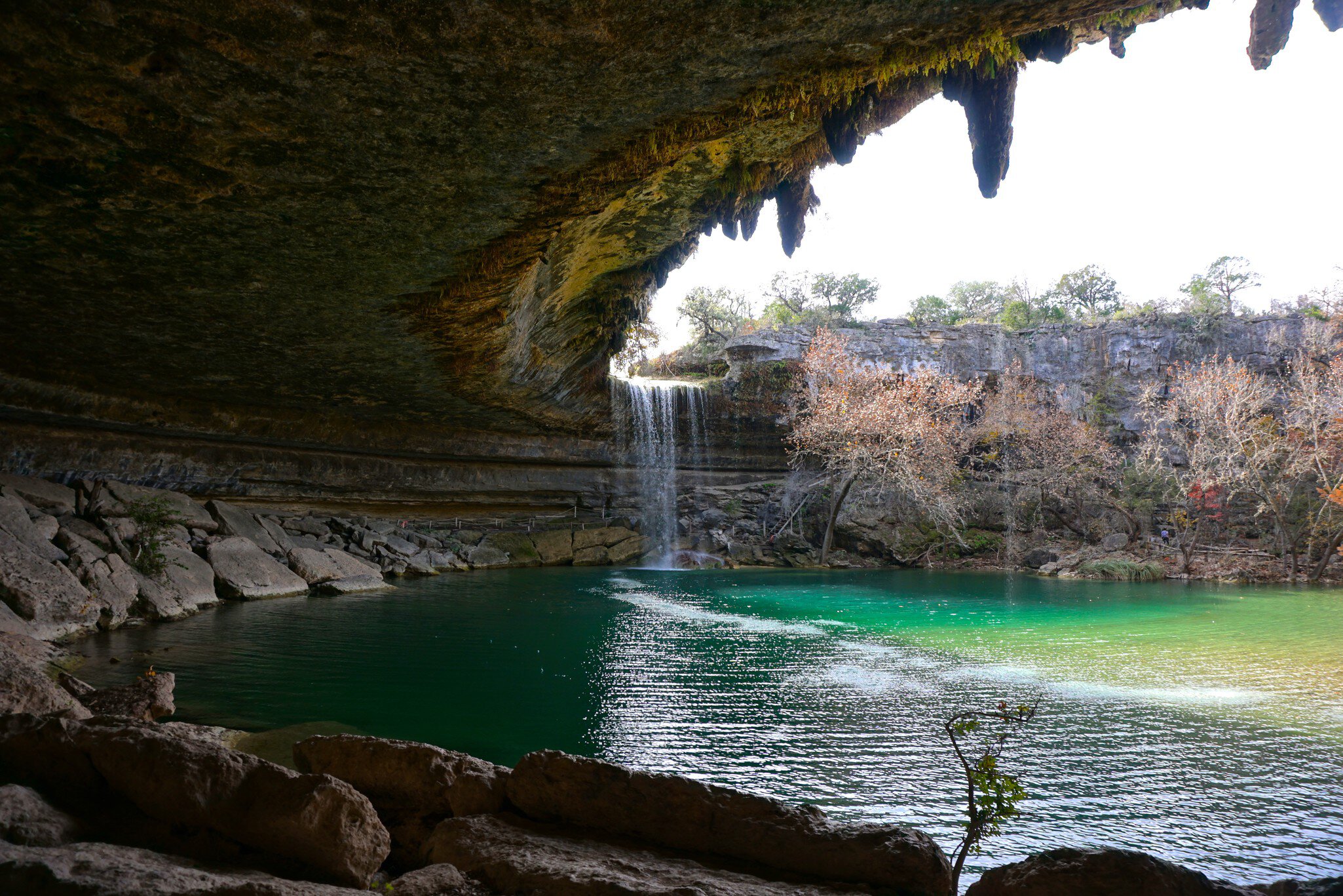 Beautiful waterfall in Hamilton Pool Preserve grotto in Central Texas with turquoise swimming hole; Shutterstock ID 1282209841;