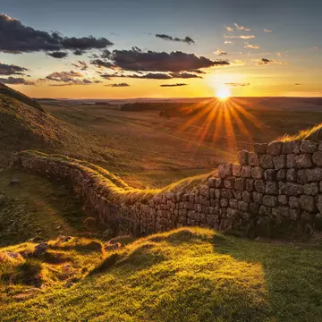 Sunset over Rapishaw Gap on Hadrian's Wall, Northumberland, England.