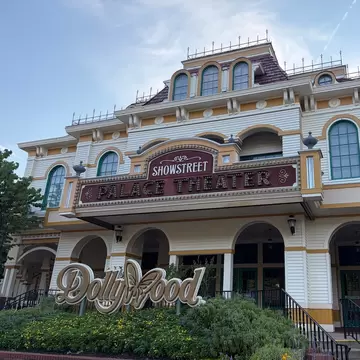 Exterior view of the Palace Theater with landscaping out front at Dollywood