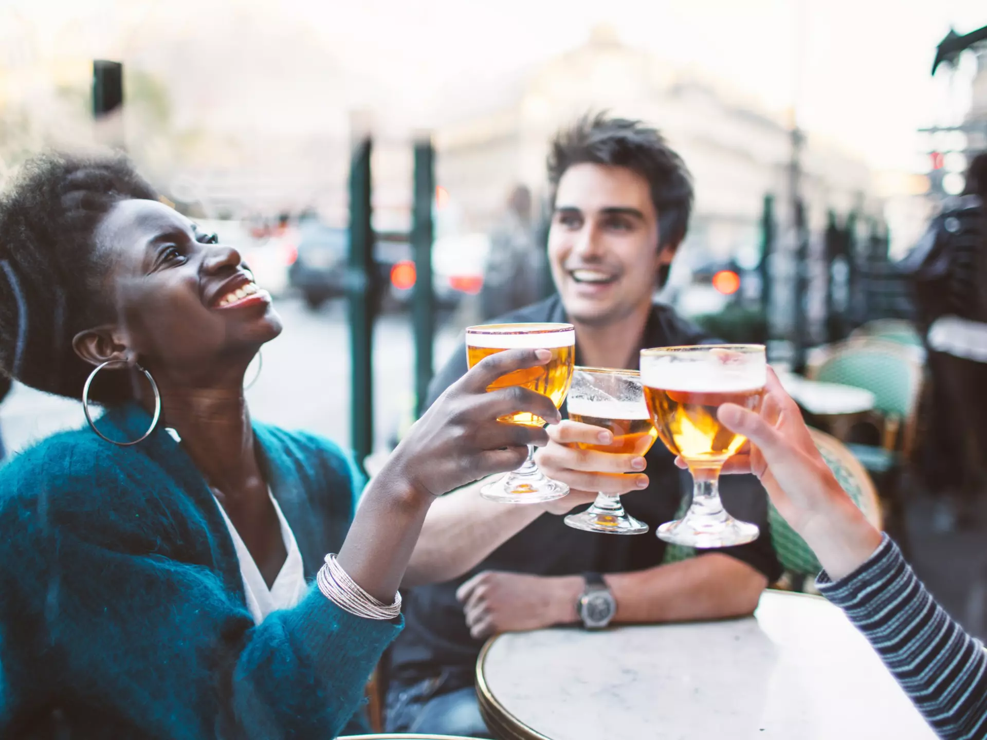 Group of friends drinking beer at a cafe.
531169566
Females, Dinner Party, Three People, Talking, Togetherness, Community, Pub, France, Cafe, French Culture, Group Of People, Happiness, Women, Foodie, Carefree, Young Men, 60527, Men, Hipster - Person, Breaking the Ice, Positive Emotion, Social Gathering, Outdoors, African Ethnicity, Alcohol, Paris - France, Female, After Work, Dusk, Capital Cities, Caucasian Ethnicity, Drinking, Young Adult, Laughing, Photography, Share, Friendship, Bar - Drink Establishment, Dining, Multi-Ethnic Group, Restaurant, Drink, Sharing, Enjoyment, Adult, Beer - Alcohol, Horizontal, LypseFRA16, Party - Social Event, Table, Celebratory Toast, Smiling, Discussion, Lifestyles, African-American Ethnicity, Food and Drink, People, 20-29 Years, City, Young Women, 60595, Celebration, PitchFRA16, Bonding, Fun, Hipster, Adults Only, Cheering