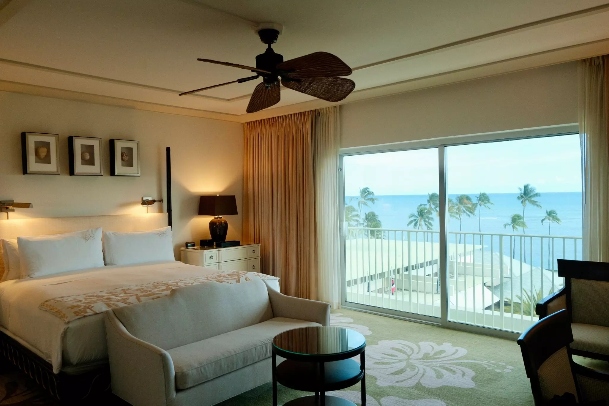 A room with a palm tree view at Kahala Hotel and Resort, Honolulu, Hawaiʻi, USA.