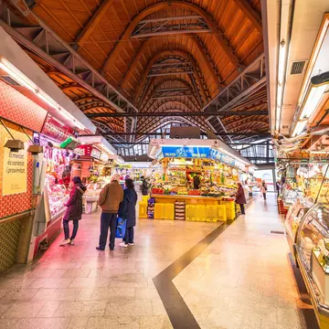 People shopping inside the Mercat de Santa Caterina in Barcelona, Spain.