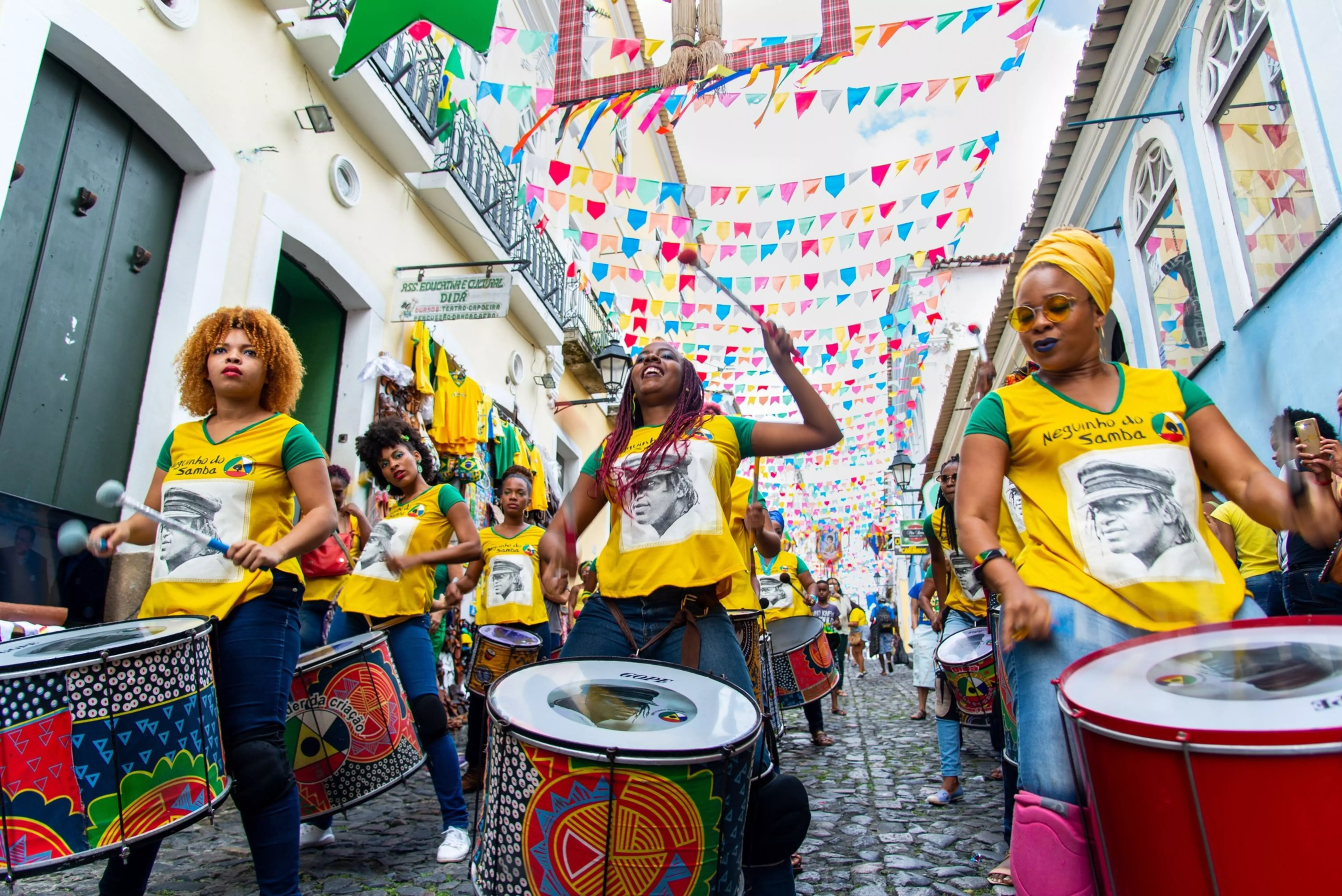 The Dida Band members play percussion instruments at Pelourinho during 2018 FIFA World Cup