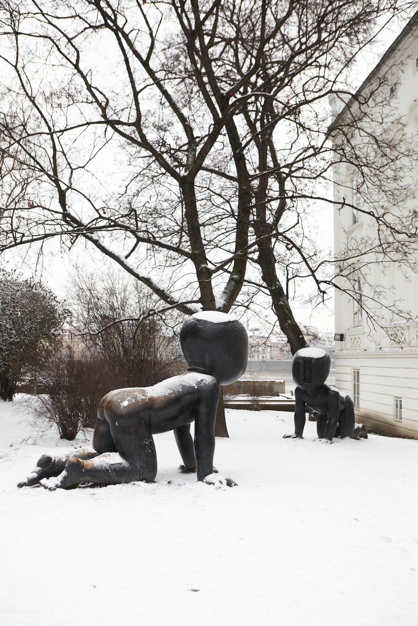 David Cerny's baby sculptures covered in snow in Kampa Park. Prague, Czech Republic.