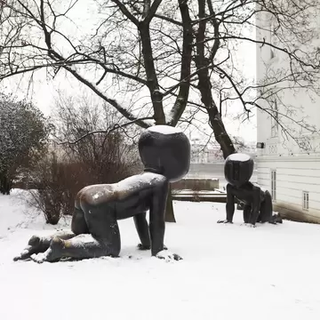 David Cerny's baby sculptures covered in snow in Kampa Park. Prague, Czech Republic.
