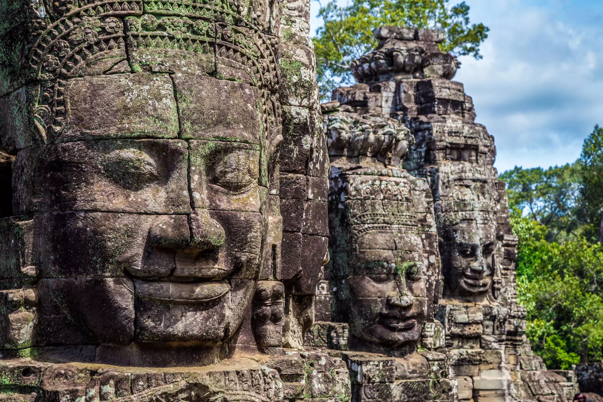 Buddhist faces on towers at Bayon Temple, Cambodia.
351555083
ancient, angkor, archeology, architectural, architecture, artistry, asia, asian, bayon, buddha, buddhism, buddhist, building, bust, cambodia, cambodian, carving, civilization, destination, face, famous, god, group, historic, landmark, monument, moss, multiple, old, place, prasat, reap, relief, religion, religious, ruins, sculpture, several, siem, stone, summer, temple, thom, three, tourism, tourist, travel, vacation, wat, worship