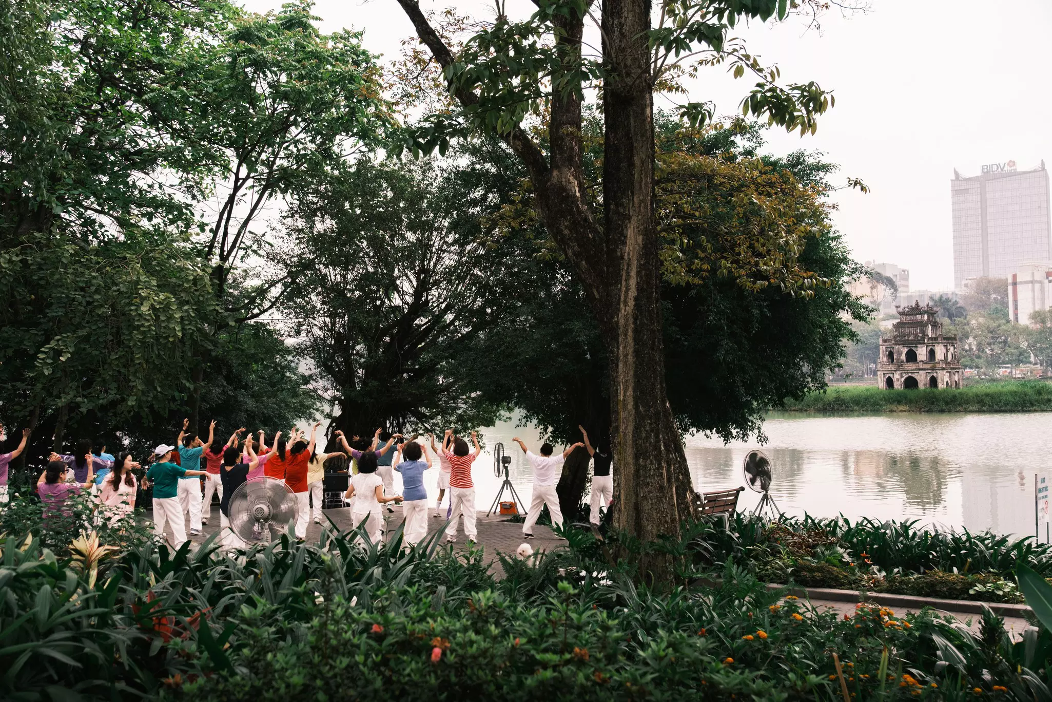 Morning exercise at Hoan Kiem Lake, Hanoi
