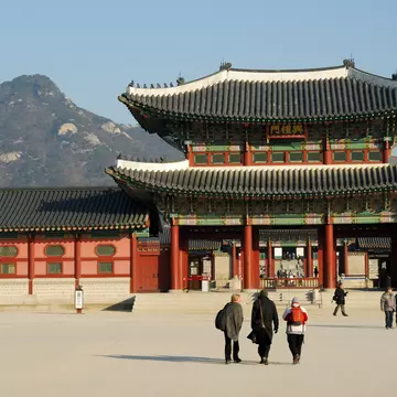 Gyeongbokgung Palace with Bugaksan in background, Gwanghwamun.
23006-2
Asia, North-East Asia, Seoul, South Korea, architecture, asian, background people, building, cropped, culture, day, differential focus, exterior, facade, front view, group of people, large group of objects, large group of people, lifestyle, luxury, majestic, mixed age range, mixed gender, mountain, outdoors, people, plenty, religion, roof, shadow, sky, technique, tourism, traditional, travel, wood, worship