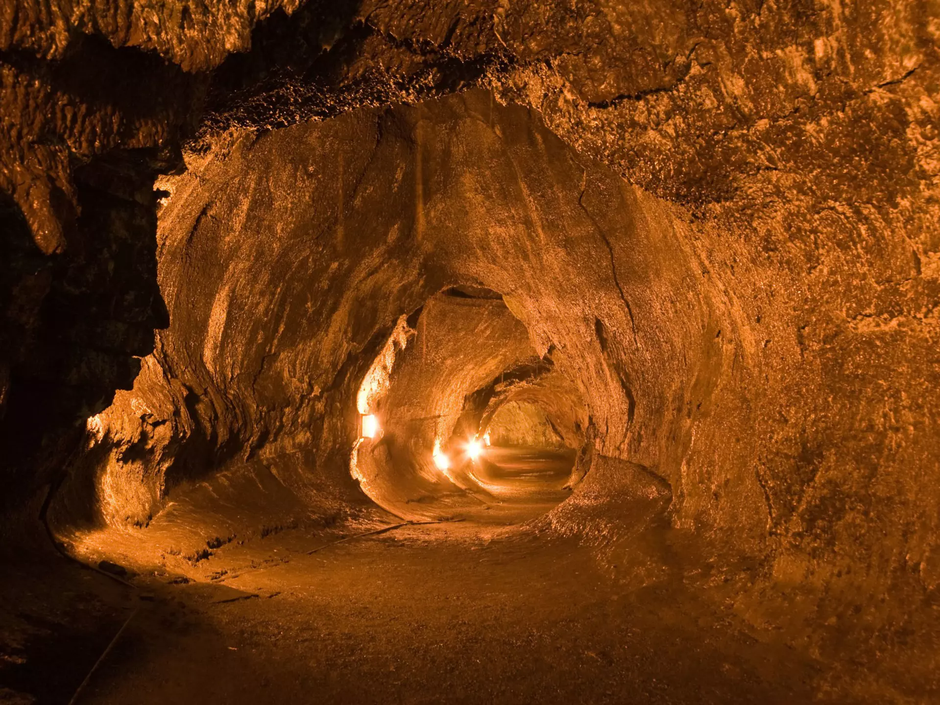 Inside the Turston Lava Tube in Hawaii Volcano National Park. HDR image created by combining three exposures.
34434805
america, big, cave, claustrophobia, claustrophobic, dark, destination, dynamic, geology, gloomy, hawaii, hdr, heritage, high, inside, island, landmark, lava, lights, national, orange, park, range, site, states, thurston, trail, travel, tube, tunnel, underground, united, usa, volcano, world
