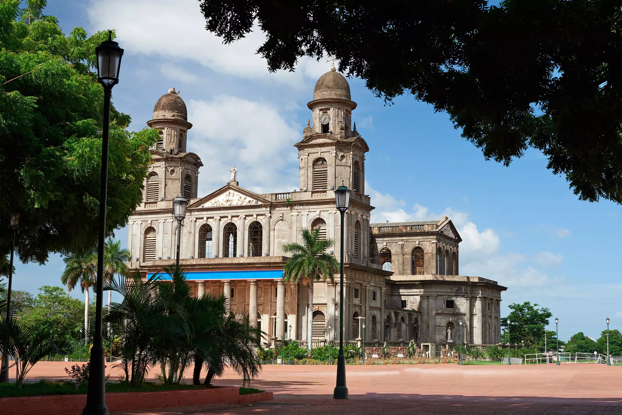 A cathedral with two domed bell towers.