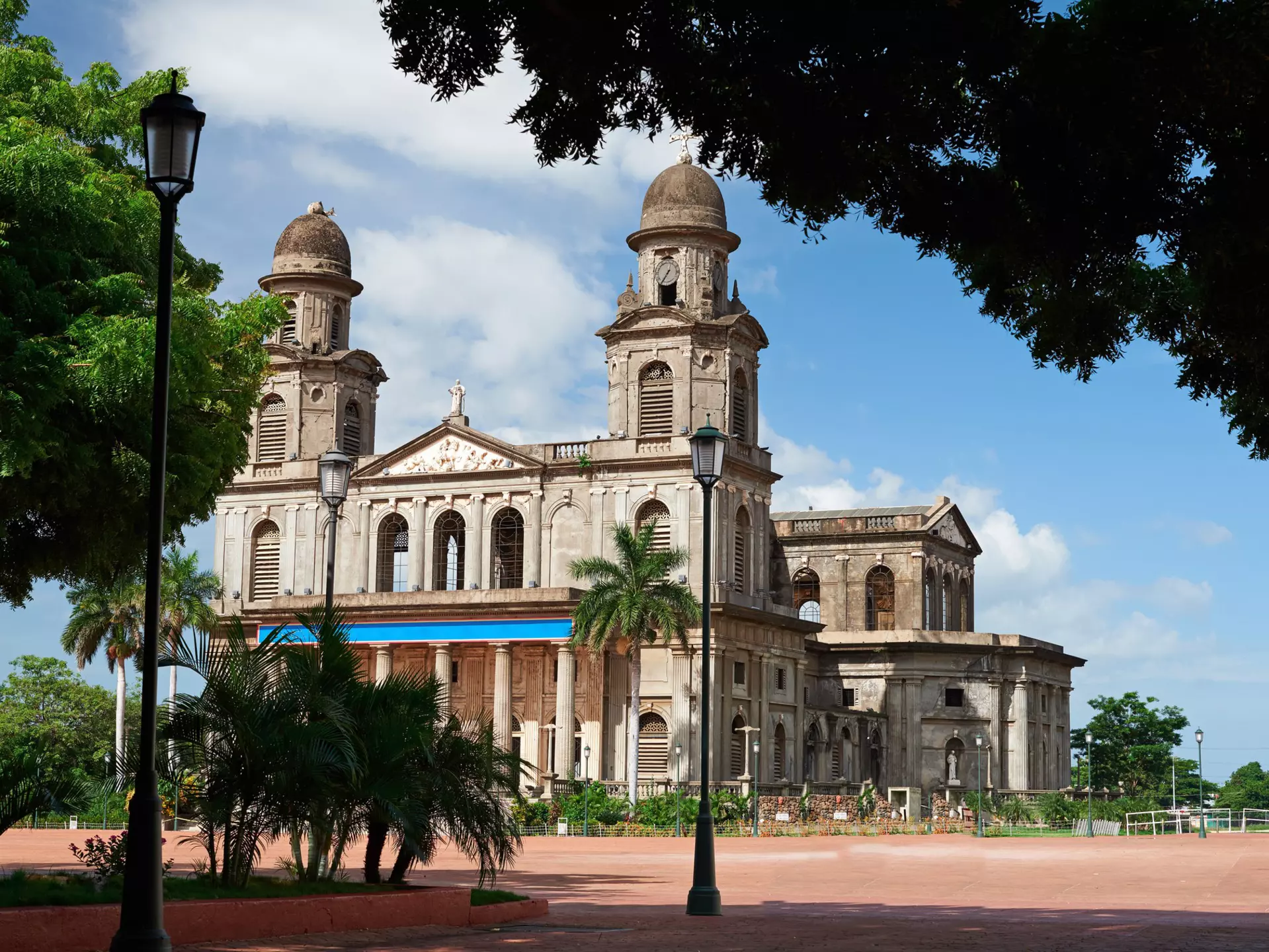 A cathedral with two domed bell towers.