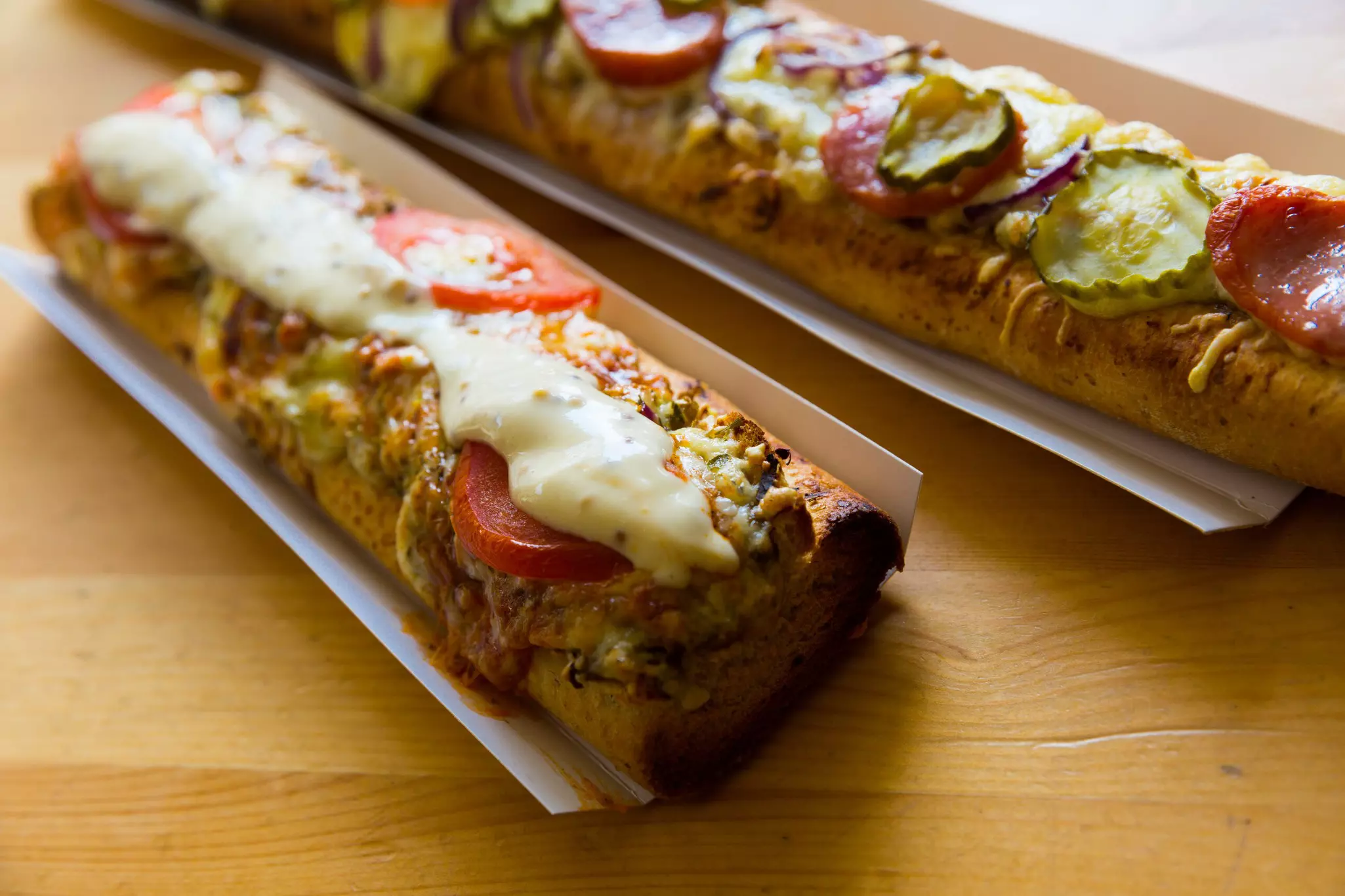 Zapiekanka, open-faced baguette, is a popular Polish street food option. JackF / Getty Images