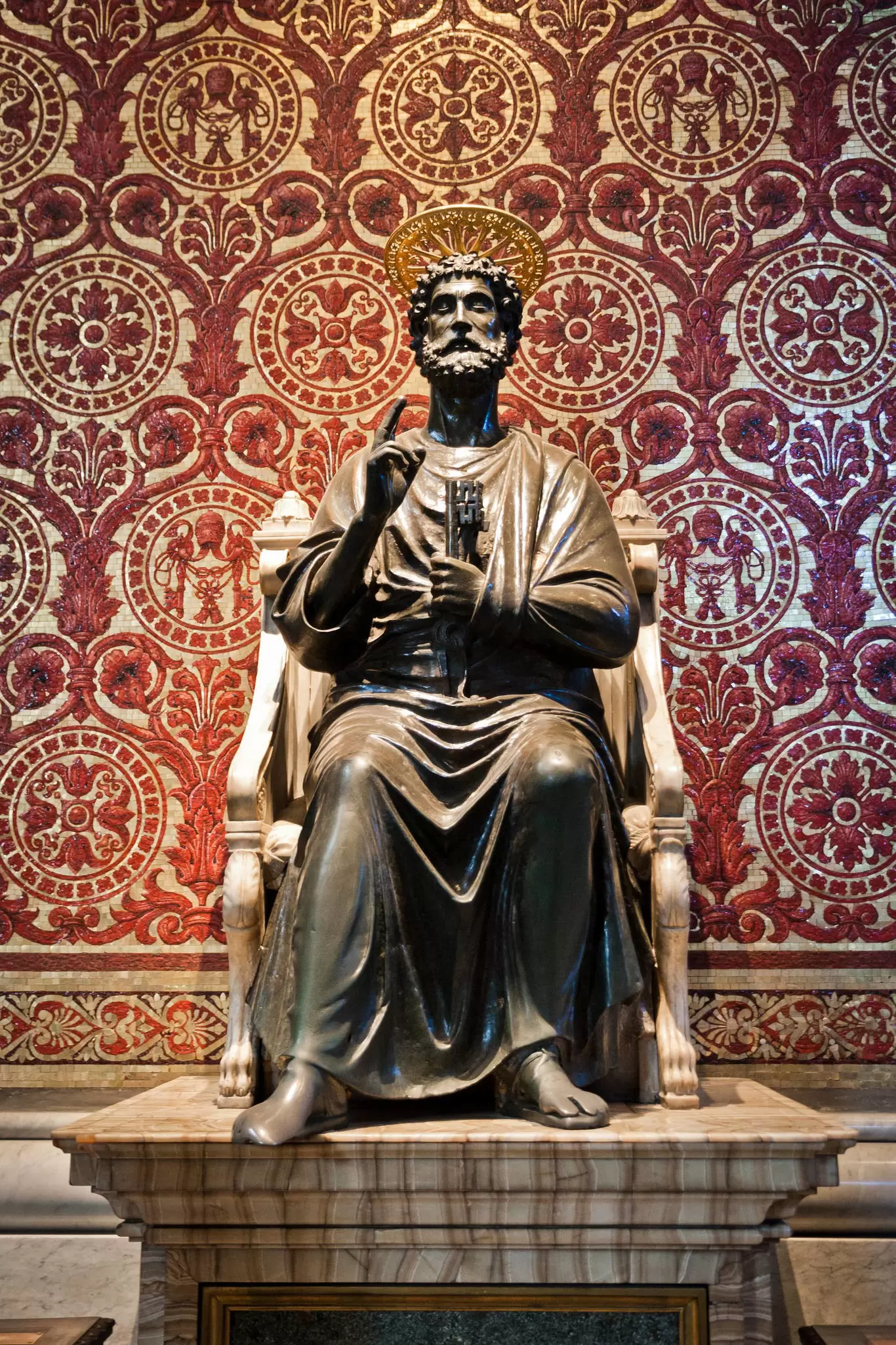 Arnolfo di Cambio’s bronze statue of Saint Peter in St. Peter's Basilica in the Vatican City in Rome, Italy.