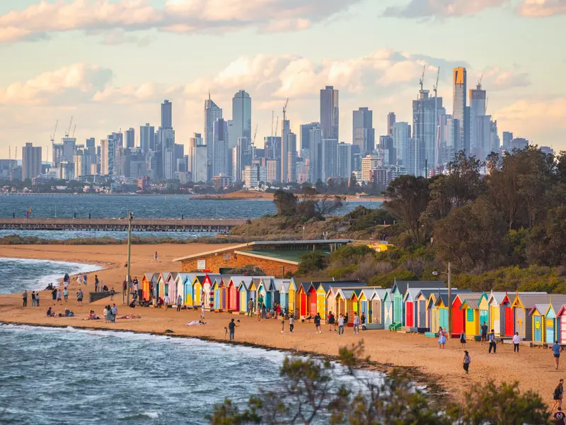 Brighton bathing boxes and Melbourne skyline.
