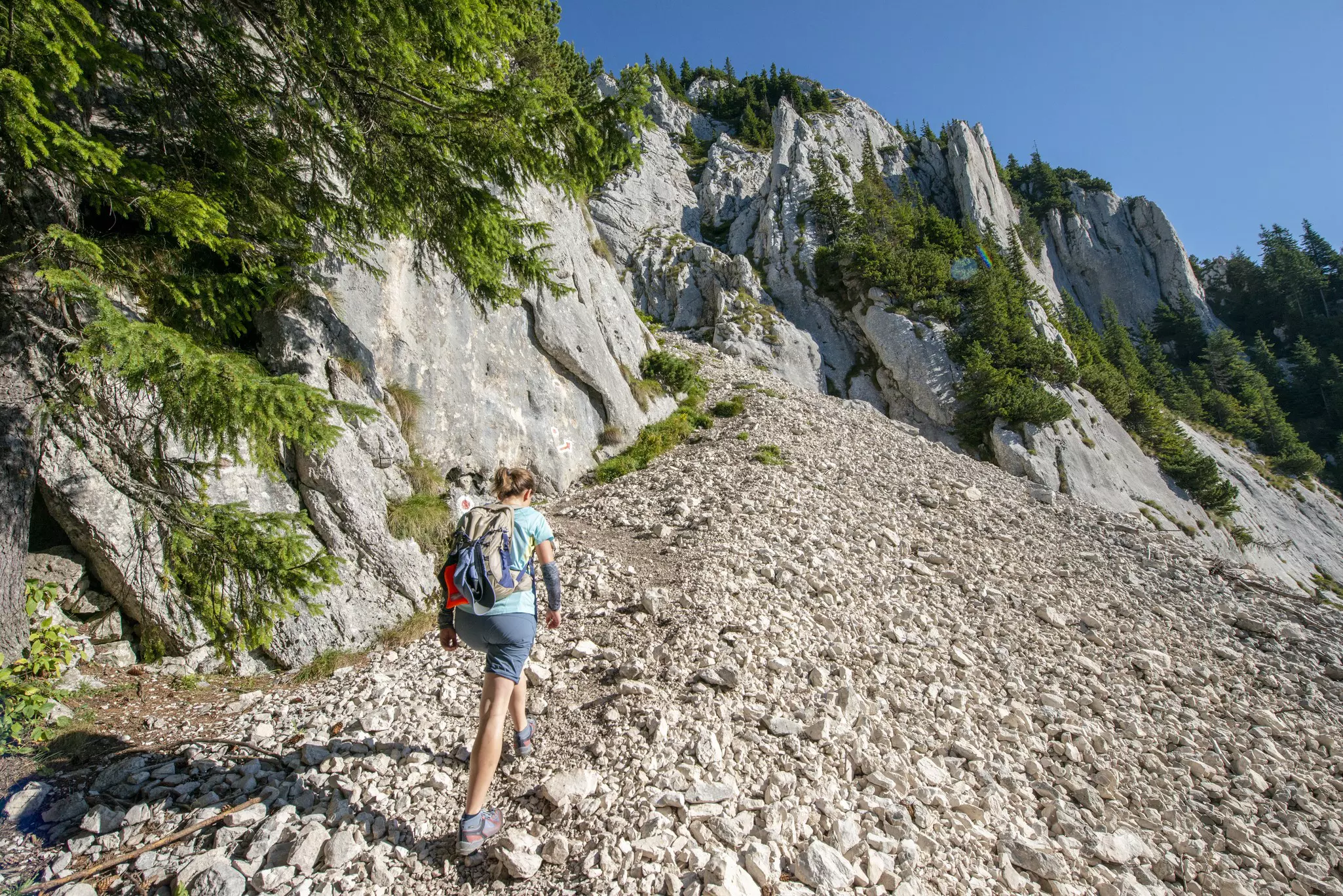 A hiker in the Piatra Craiului mountains in Romania.