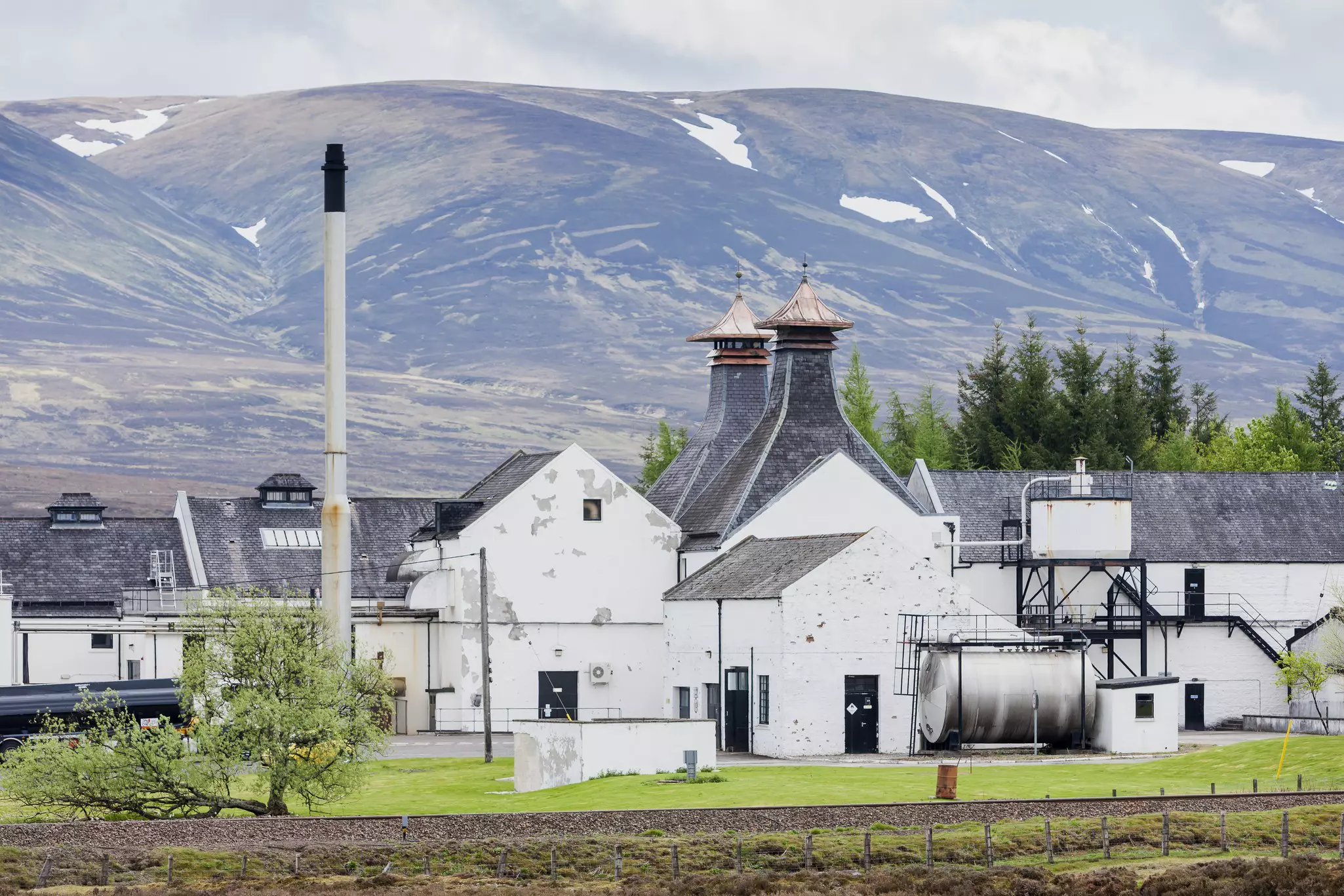 View of the Dalwhinnie distillery on the edge of Cairngorms National Park.