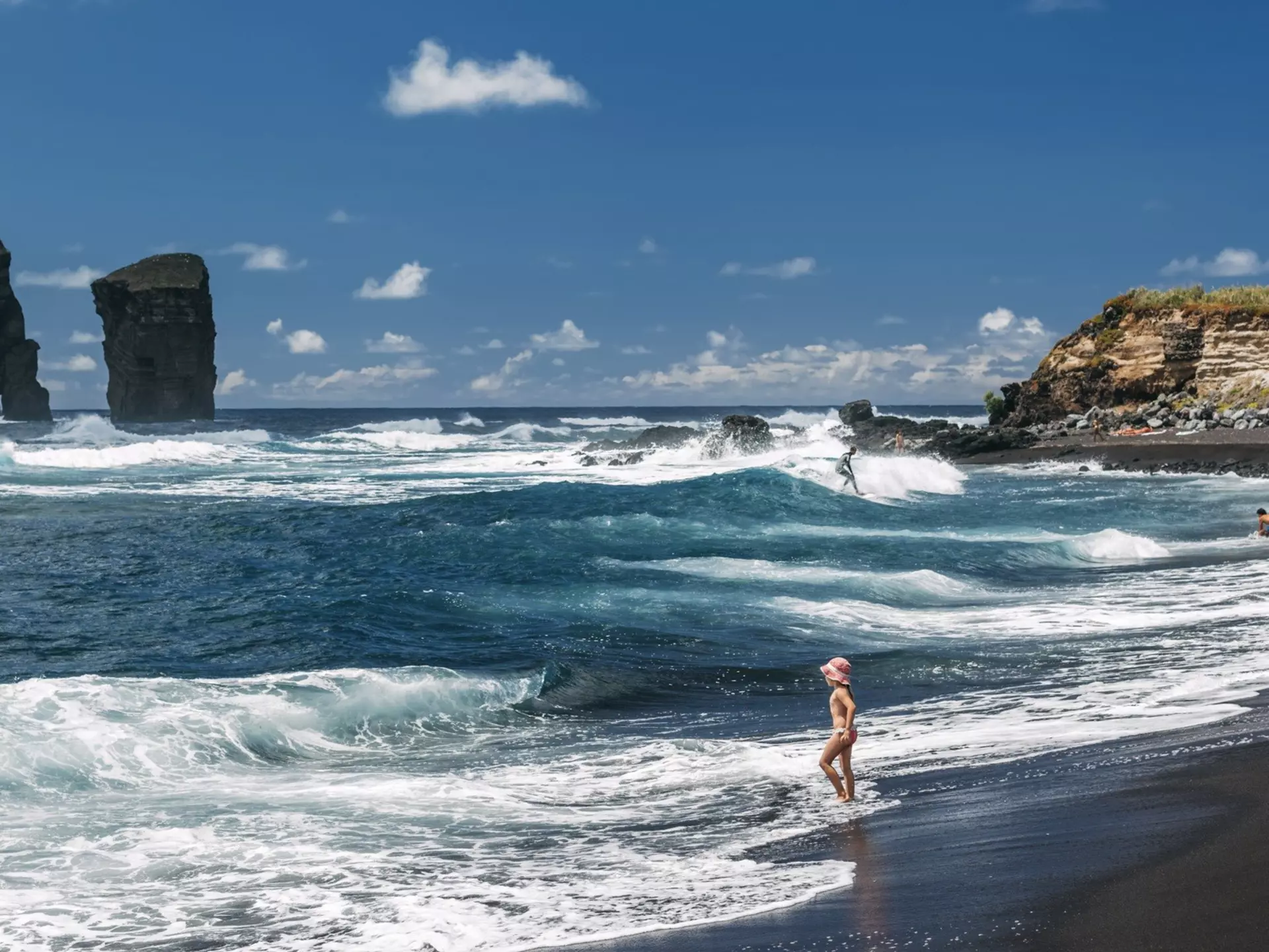 Rough surf at Praia dos Mosteiros, São Miguel, the Azores. Nessa Gnatoush/Shutterstock