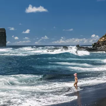Rough surf at Praia dos Mosteiros, São Miguel, the Azores. Nessa Gnatoush/Shutterstock