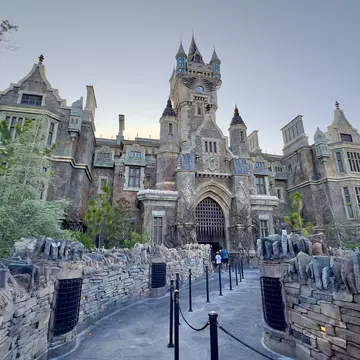 Guests approach the gothic castle in the Dark Universe at Universal’s Epic Universe in Orlando, Florida.