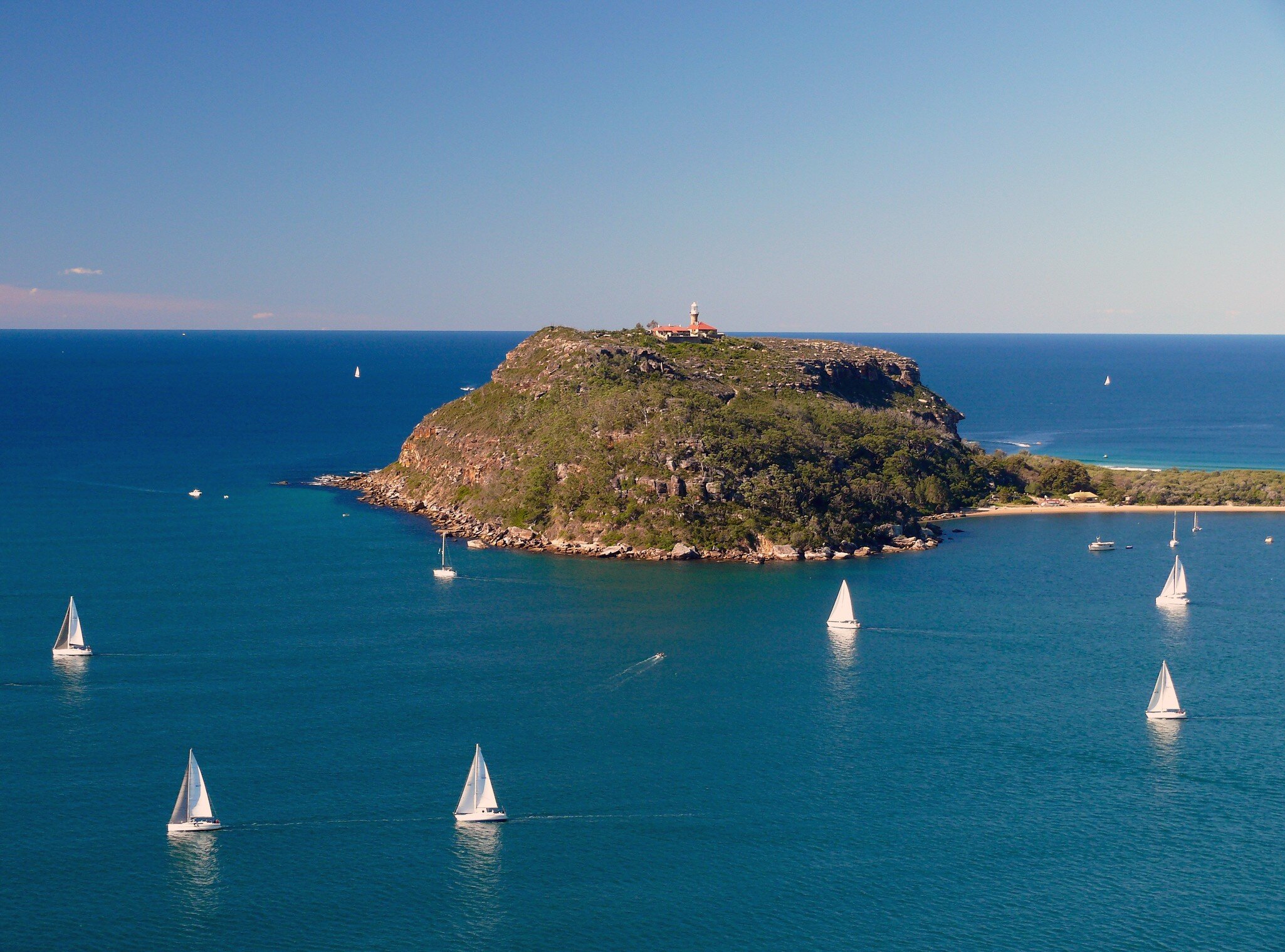 The Barrenjoey Headland and Lighthouse as seen from West Head Lookout. View from West Head Walk in Sydney's Ku-ring-gai Chase National Park. Sydney, Australia.