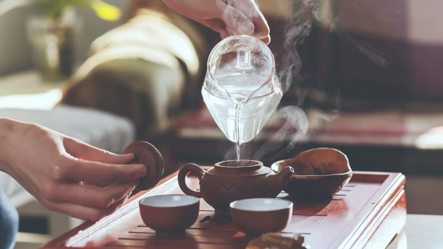 The tea ceremony. The woman pours hot water into the teapot with tea
666593392
fill, woman, chahai