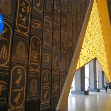 Tourists visit the open areas of the grand hall of the Grand Egyptian Museum in Giza in February © Sui Xiankai/Xinhua via Getty Images