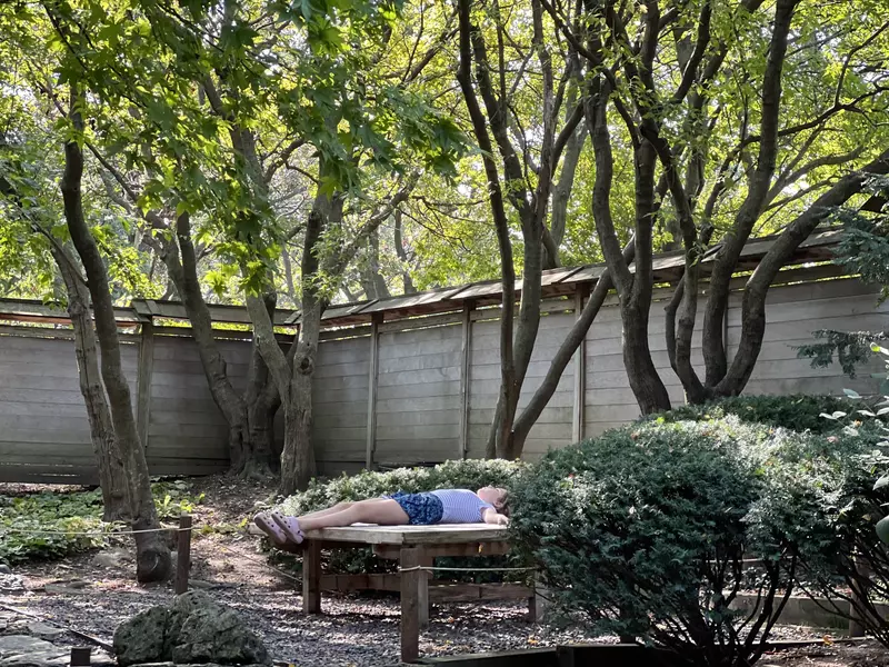 Writer's daughter meditating at a Japanese garden in Urbana, Illinois. Sarah Stocking for Lonely Planet