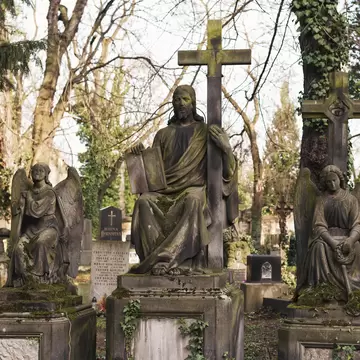 Prague, Czech Republic. Olšany cemetery, ancient catholic graves, angels and crosses.