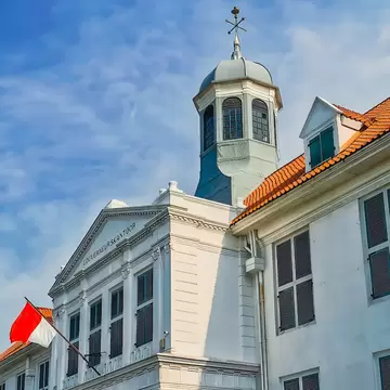 Indonesian red white flag flies gracefully on the building of The Jakarta History Museum or Museum Sejarah Jakarta or Fatahillah Museum or Batavia Museum, in the Jakarta Old Town, Kota Tua area. , License Type: media, Download Time: 2025-05-28T10:02:18.000Z, User: lonelyplanetmedia, Editorial: false, purchase_order: 65050 - Digital Destinations and Articles, job: Global Publishing WIP, client: Global Publishing WIP, other: Peterson Haggarty // SS Comp Ingestion