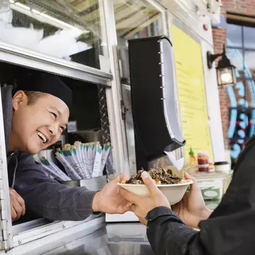 Man buying a bowl of food from a food truck in Richmond.
672161823
Standing, People, Selling, 30-34 Years, Young Adult, Hold, Order, Customer Service Representative, Looking Down, Two People, 30-39 Years, Mid Adult, Focus, Side View, Asian and Indian Ethnicities, Serving Food and Drinks, Horizontal, Holding, City Life, Bowl, Real People, City, Image Focus Technique, Black Hair, Photograph, Millennial, Anticipation, Enjoyment, Small Business, Business, Serving, Tater-Tot, Cheerful, Food, Service, Young Men, Youth Culture, Men, Profile, Mid Adult Men, Multi-Ethnic Group, 20-24 Years, Day, Selective Focus, Entrepreneur, Adults Only, Outdoors, Smiling, USA, Food Truck, Looking Down On, Buying, Candid, Adult, Authentic, Headshot, Cookery, Profile View, Virginia - US State, Only Men, Commercial Land Vehicle, Richmond, Photography, Close-up, Owner, Color Image, Food and Drink, Latin American and Hispanic Ethnicity, Richmond - Virginia, Truck, Business Finance and Industry, Concession Stand, Millennial Generation