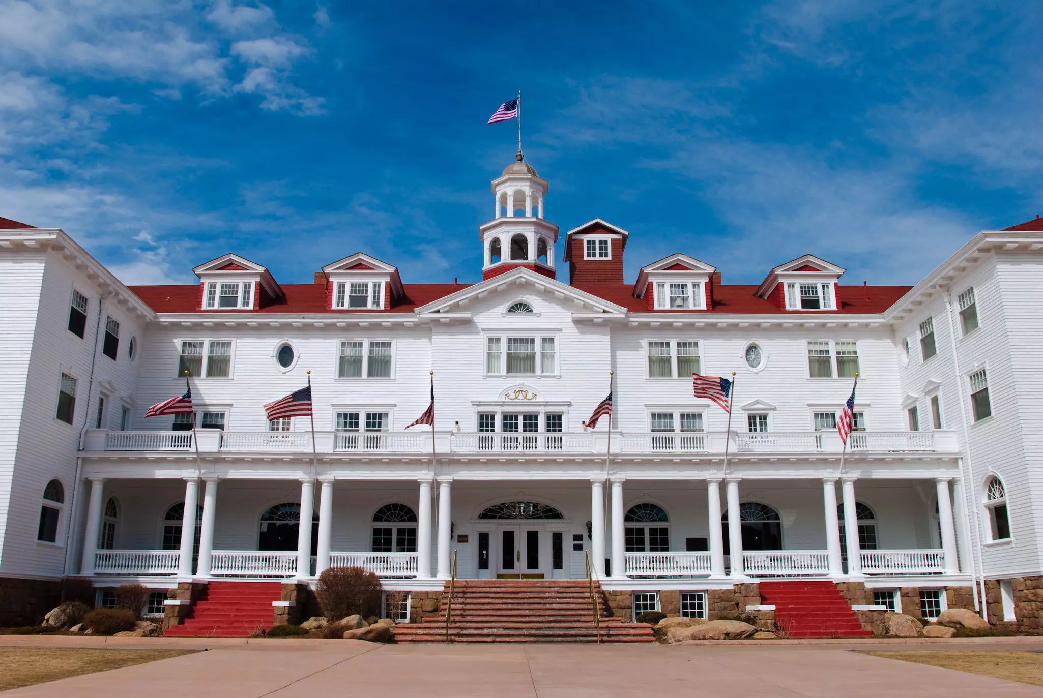 White facade of the Stanley Hotel in Estes Park.