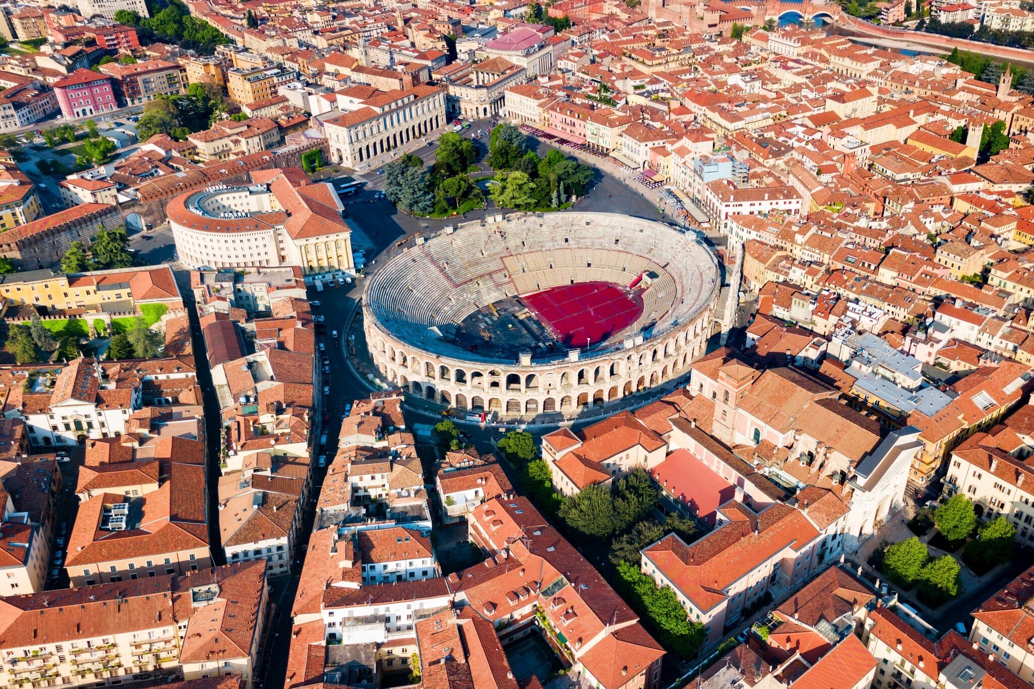 Aerial view of Verona Arena, a Roman amphitheater in Verona, Italy surrounded by the city center.