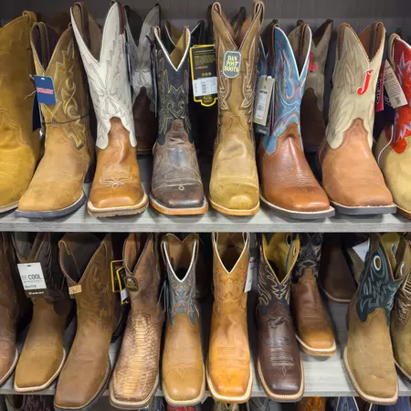 01 JUNE 2025 - Austin, TX, USA - A row of traditional authentic cowboy boots for sale in a store in Austin, TX, License Type: media, Download Time: 2025-09-10T12:24:03.000Z, User: sashabrady26, Editorial: true, purchase_order: 65050 - Digital Destinations and Articles, job: Lonely Planet, client: Best things to do in Austin, other: Sasha Brady